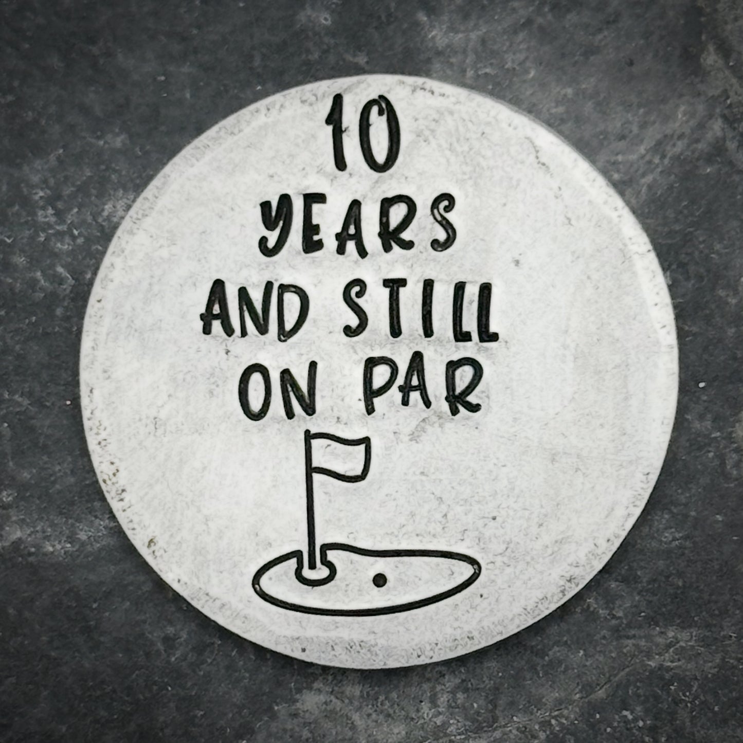 10 years and still on par Golf ball marker