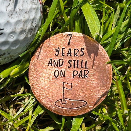 7 years and still on par. Golf ball marker