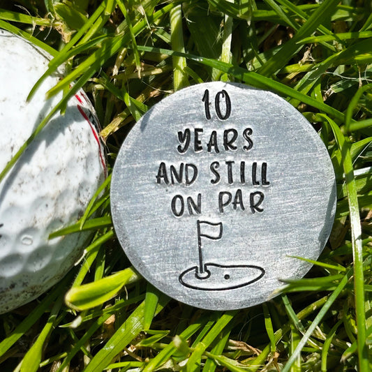 10 years and still on par Golf ball marker